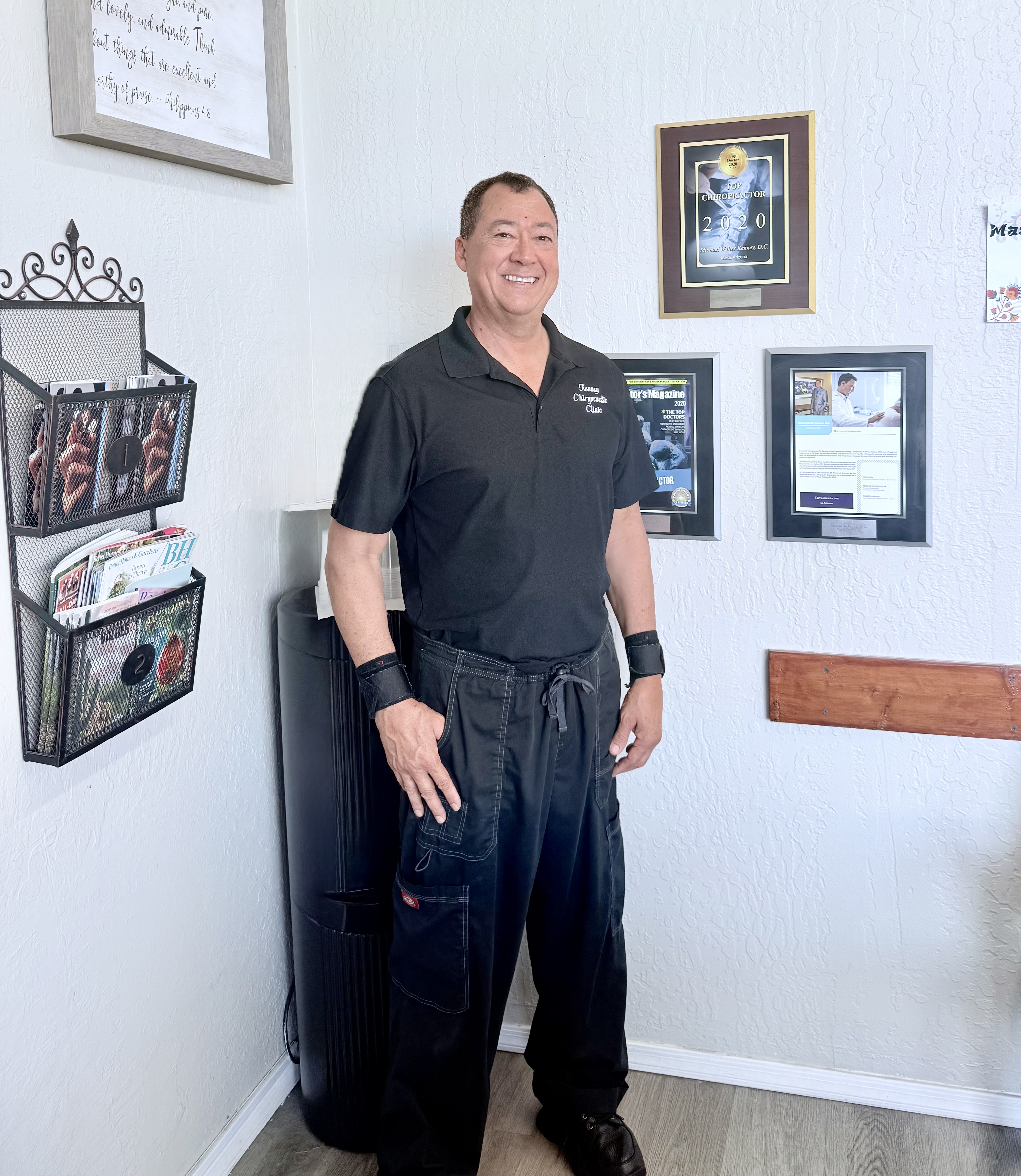 Dr. Michael Kenney with his professional awards